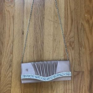 Mauve evening clutch with hip length chain